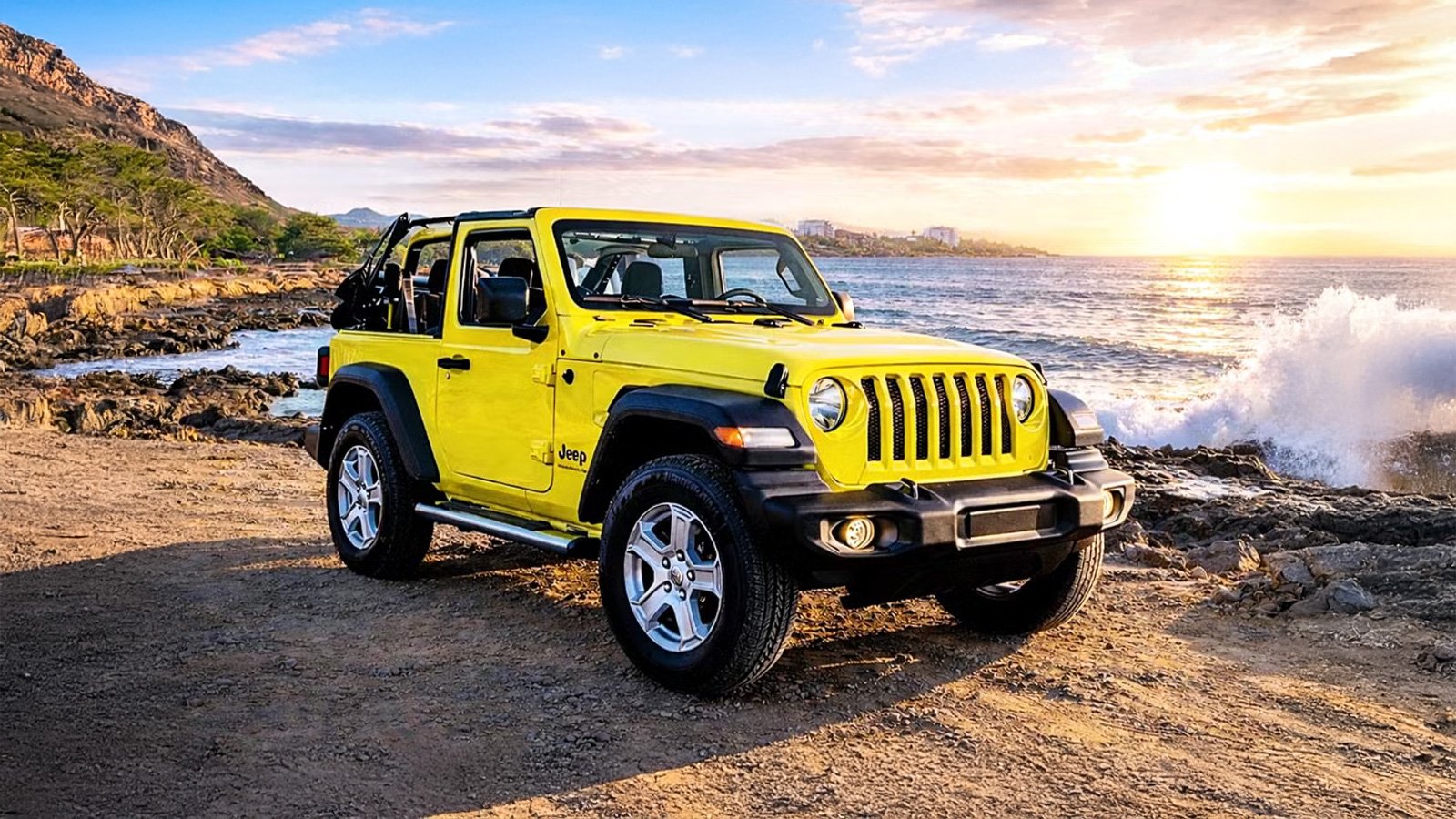 Yellow Jeep Wrangler on a scenic Oʻahu coastline